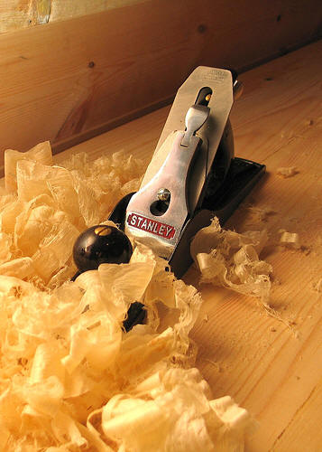 Wood plane and shavings
