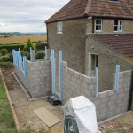 Blockwork going up with insulated cavity closers in place