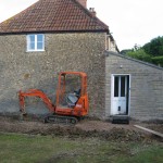 Mini digger on site